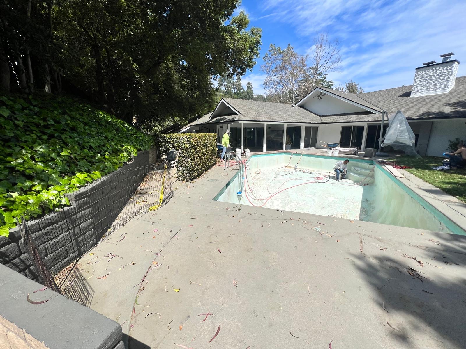 Existing pool during demolition