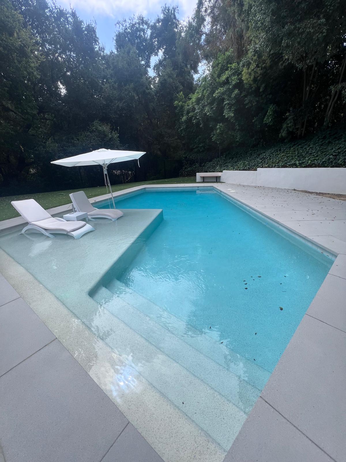 Completed pool sun shelf and steps