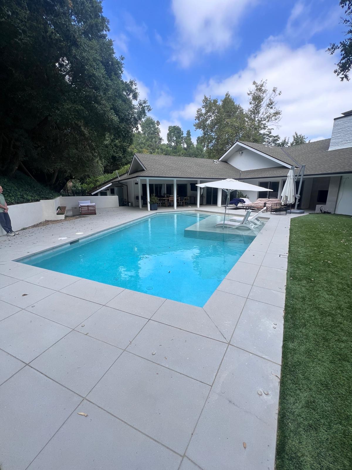 Completed pool and backyard outdoor living area