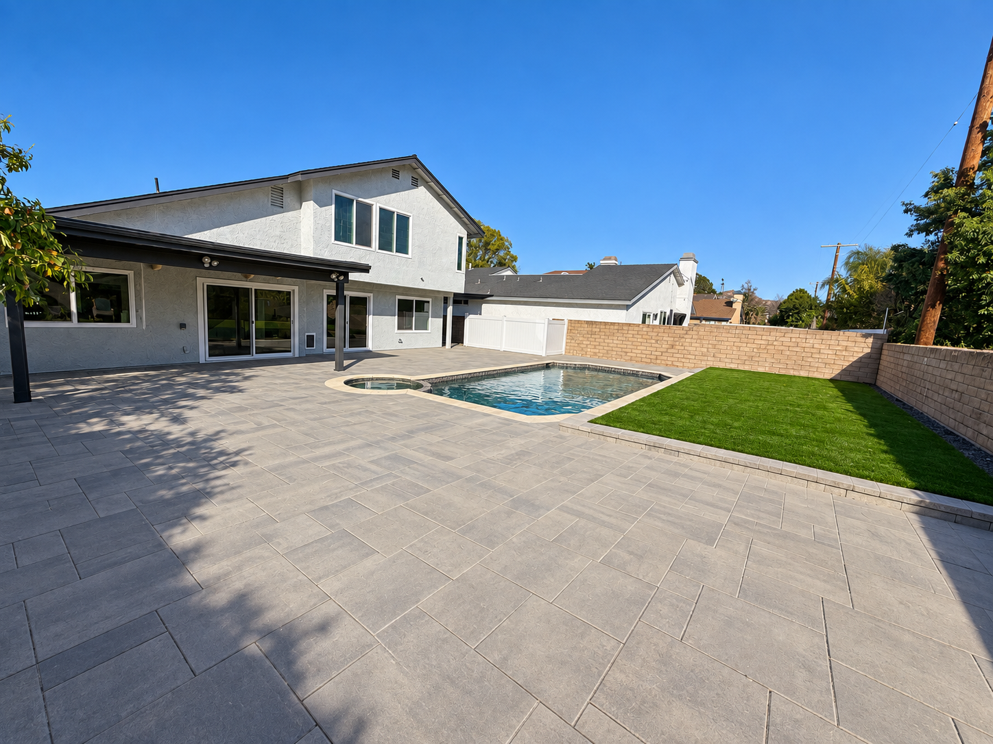 Backyard swimming pool and outdoor living area