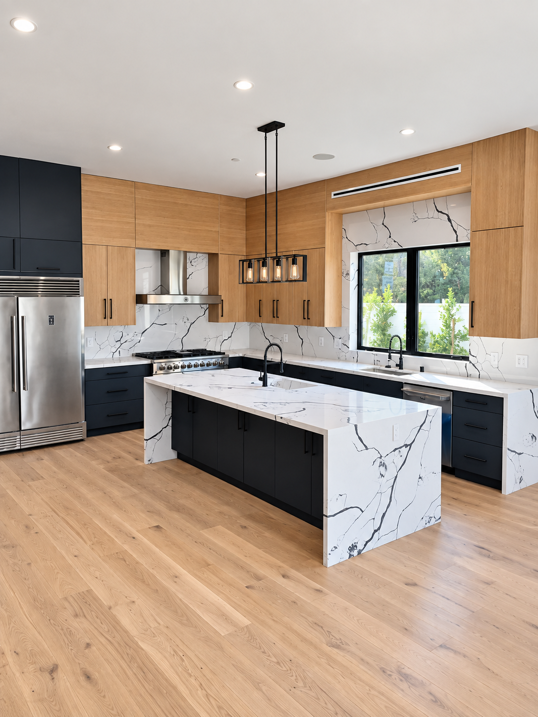Modern wood and black kitchen with waterfall island