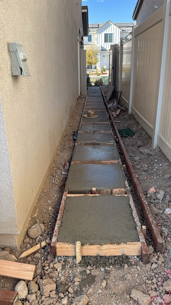 Concrete Walkway Installation for Ocean Home Builders backyard project in Santa Clarita